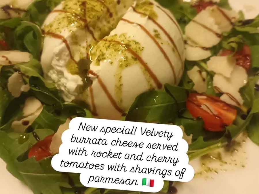 From our Specials Menu. Velvety burrata cheese served with rocket and cherry tomatoes and shavings of parmesan. From our Specials Menu. Velvety burrata cheese served with rocket and cherry tomatoes and shavings of parmesan.